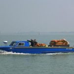 Funeral boat in Venice heading to San Michele island