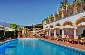 Image of the outdoor swimming pool at San Domenico Palace Hotel Taormina